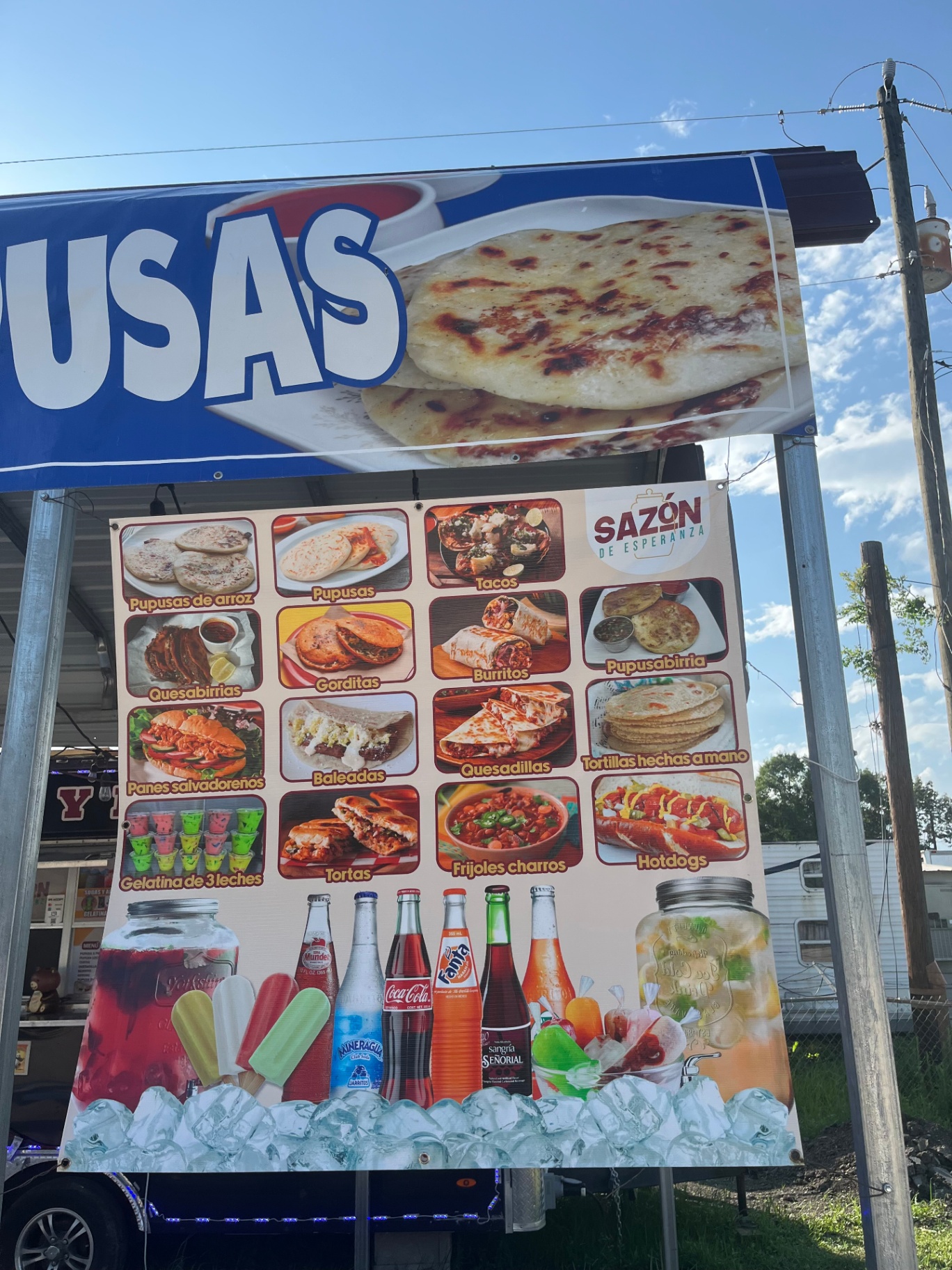 Sazón menu banner with photos of pupusas, tacos, tortas